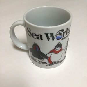 Sea World of San Diego Coffee Mug Penguins in Scarves Tea Cup Orca Logo Vintage